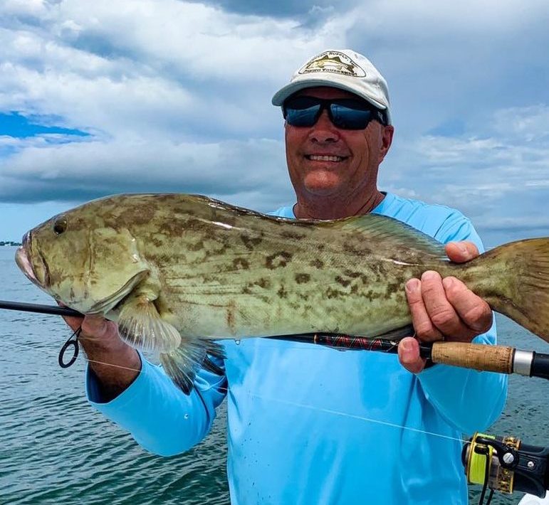 a picture of a grouper caught of holmes beach on AMI