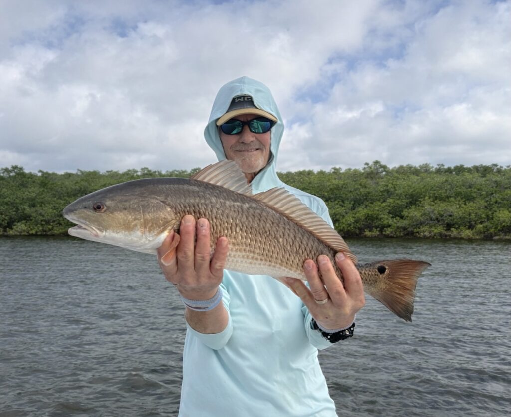 a picture of April Fishing on Anna Maria Island with Captain Nate