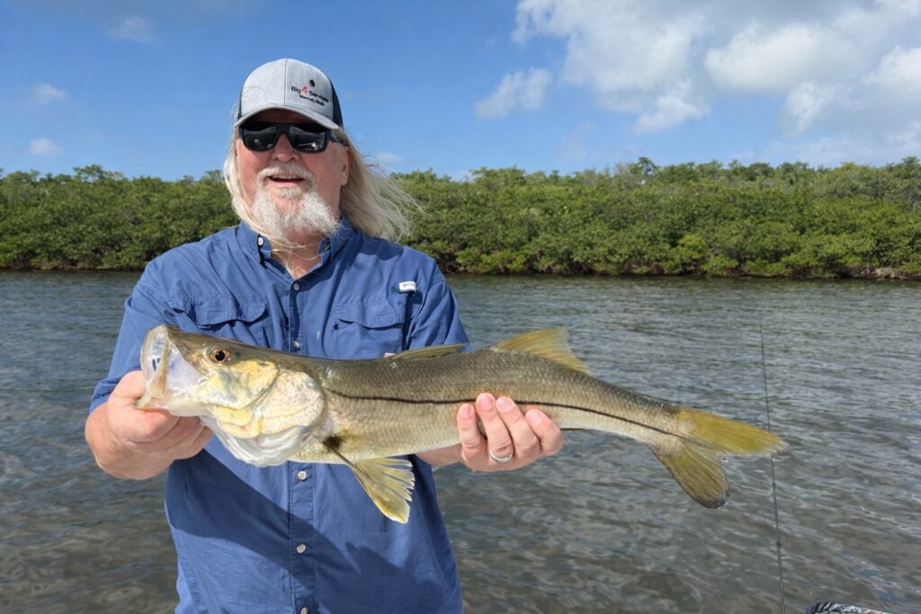 a picture of April Fishing on Anna Maria Island with Captain Nate