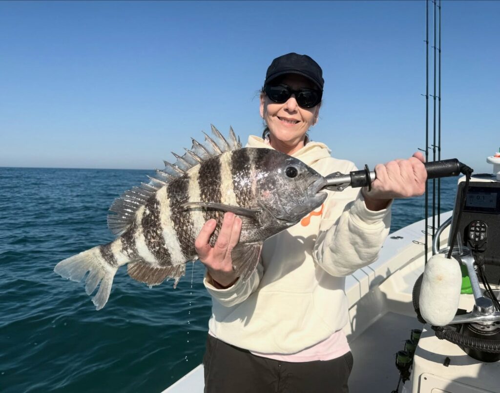 a picture of April Fishing on Anna Maria Island with Captain Nate