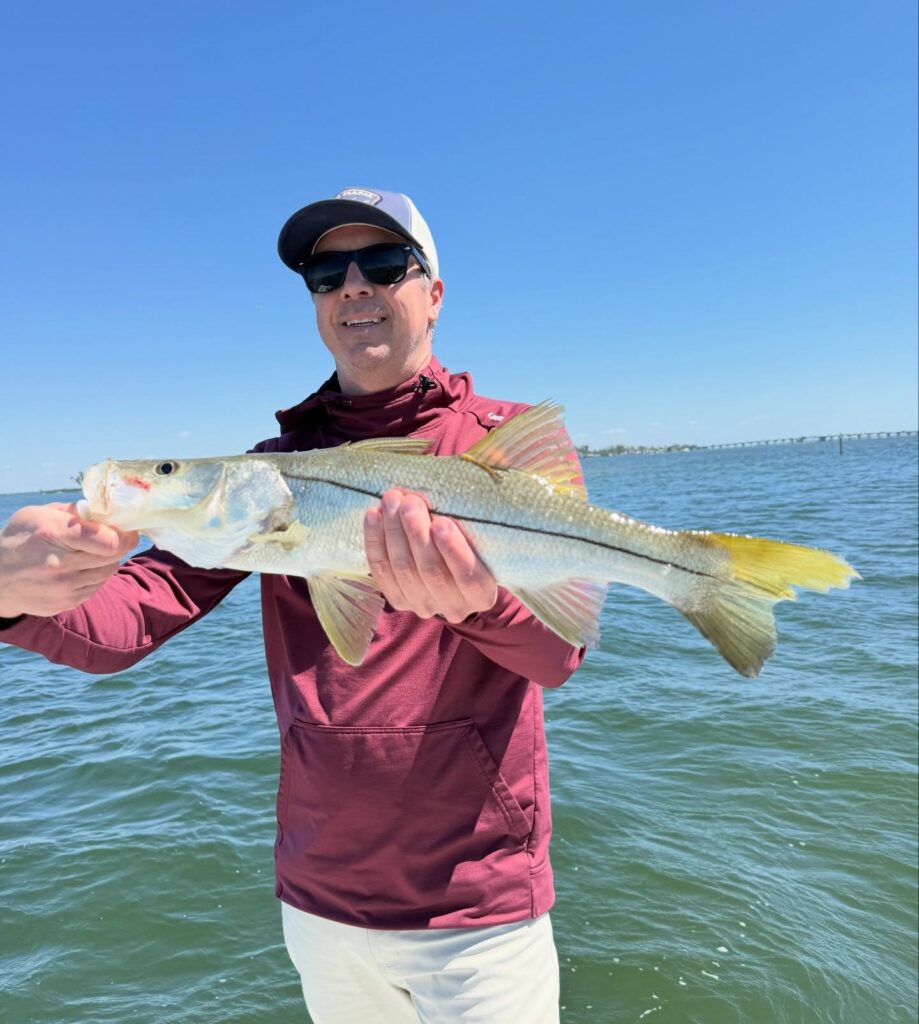 a picture of April Fishing on Anna Maria Island with Captain Nate