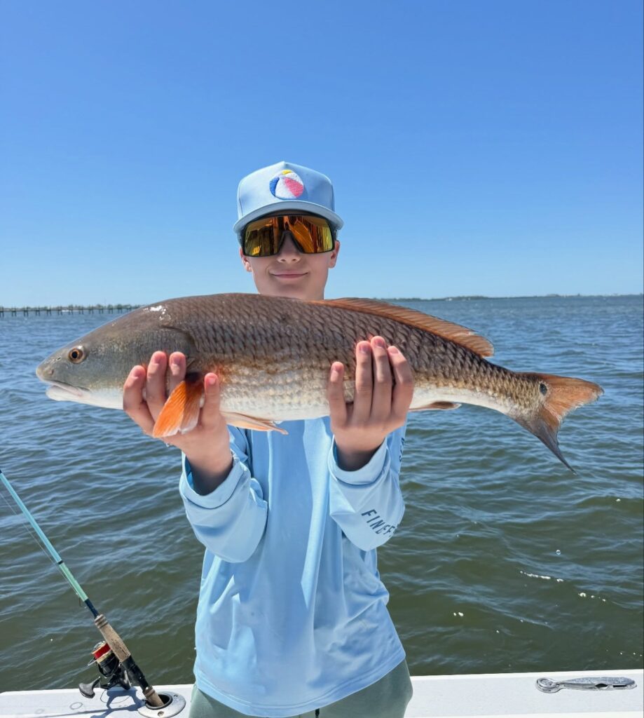 a picture of April Fishing on Anna Maria Island with Captain Nate